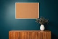 Blank picture frame mockup on green wall. View of modern scandinavian style interior with artwork mock up on wall Royalty Free Stock Photo