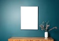 Blank picture frame mockup on green wall. View of modern scandinavian style interior with artwork mock up on wall Royalty Free Stock Photo