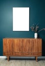 Blank picture frame mockup on green wall. View of modern scandinavian style interior with artwork mock up on wall Royalty Free Stock Photo