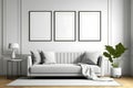 Blank picture frame mockup on white wall. Modern living room design. View of modern scandinavian style interior with sofa. Royalty Free Stock Photo