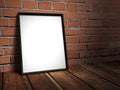 Blank picture frame on red brick wall Royalty Free Stock Photo
