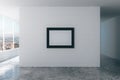 Blank picture frame on white brick wall in empty loft room, mock Royalty Free Stock Photo