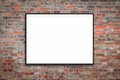 Blank picture frame / white canvas on vintage brick wall background Royalty Free Stock Photo