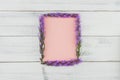 Blank pink card decorated with violet liatris flowers