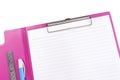 Blank pink clipboard with pen and ruler