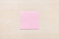 Blank pink sheet of note paper on light board Royalty Free Stock Photo