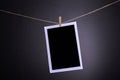 Blank polaroid photographs hanging Royalty Free Stock Photo