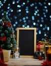 Blank Portrait Blackboard Between Christmas Decoration. Copy Spa