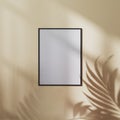 Blank poster frame mock up on earth tone brown wall with palm leaf shadow, 3d illustration Royalty Free Stock Photo