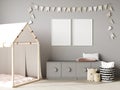 Blank poster frames mock up on gray wall in nursery room interior background with baby bedding, soft toys, garland flags, 3d