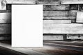 Blank poster leaning at plank wood wall and diagonal wood floor,Mock up for adding your design Royalty Free Stock Photo