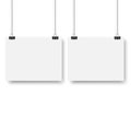 Blank posters hanging on a binder clips. White paper sheet hangs on a rope with clips. Vector Royalty Free Stock Photo