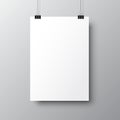 Blank posters hanging with shadows. Hanging white paper on binders. A4 paper page, mockup, sheet on wall - vector