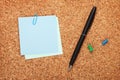 Blank postit notes on cork notice board Royalty Free Stock Photo