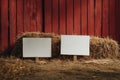Blank Protest Placards Against Red Barn Wall with Hay Bales Royalty Free Stock Photo