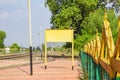 Blank railway sign board at railway station platform of mountain village Kalakund near Mhow, Indore, Madhya Pradesh on a sunny Royalty Free Stock Photo