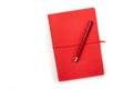 Blank red book and red pen