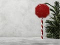 Blank red stop sign with candy cane post in front of a white wall Royalty Free Stock Photo