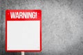 Blank red warning sign on gray background. Royalty Free Stock Photo