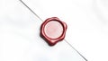 Blank red wax stamp on paper envelope mockup, top view, depth of field, 3d rendering. Empty antique wax seal for mail
