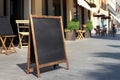 Blank restaurant shop sign or menu boards near the entrance to restaurant. Cafe menu on the street. Blackboard sign mockup in