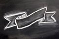 Blank ribbon draw by white chalk on black board