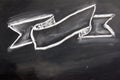 Blank ribbon draw by white chalk on black board