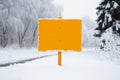 A blank road traffic sign warning of winter driving conditions on a road Royalty Free Stock Photo