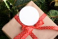 Blank round Christmas gift tag mockup or sticker with present box, product label mockup Royalty Free Stock Photo