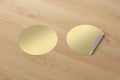 Blank  round stickers straightened and with folded corner Royalty Free Stock Photo