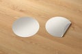 Blank round stickers straightened and with folded corner