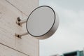 Blank round store signboard. Empty shop lightbox on the wall. 7