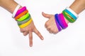 Blank rubber wristbands on wrist arm. Silicone fashion round social bracelet wear hand. Unity band. Royalty Free Stock Photo