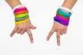 Blank rubber wristbands on wrist arm. Silicone fashion round social bracelet wear hand. Unity band.