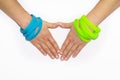 Blank rubber wristbands on wrist arm. Silicone fashion round social bracelet wear hand. Unity band.