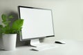 Blank screen desktop computer on a office desk. Generative AI illustration Royalty Free Stock Photo