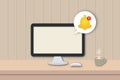 Blank screen desktop computer on table with notification and coffee cup on wood background. Concept of new email message. Royalty Free Stock Photo