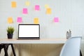 Blank screen laptop computer on wood table in room office. Royalty Free Stock Photo