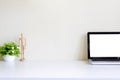 Blank screen mockup laptop computer on workspace. Royalty Free Stock Photo
