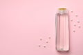 Blank shampoo bottle on pink background space for text Royalty Free Stock Photo