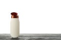 Blank shampoo bottle on wooden table isolated on background Royalty Free Stock Photo