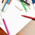 Blank sheet of paper covered with markers Royalty Free Stock Photo