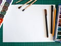 Blank sheet of paper and drawing accessories Royalty Free Stock Photo