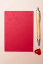 Blank sheet of paper heart and pen on table Royalty Free Stock Photo