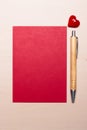Blank sheet of paper heart and pen on table Royalty Free Stock Photo