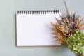 Blank sheet paper notebook on colored background top view. Flat lay Royalty Free Stock Photo