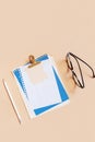 Blank sheet paper notebook on colored background top view. Flat lay Royalty Free Stock Photo