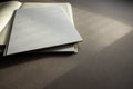 blank sheets notebook sketchbook on gray background