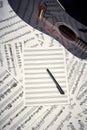 Blank sheets for notes, pen and guitar Royalty Free Stock Photo