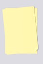 Blank sheets of yellow paper